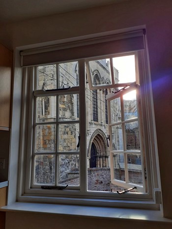 Window overlooking old church | York Conservation Trust | PAS2030